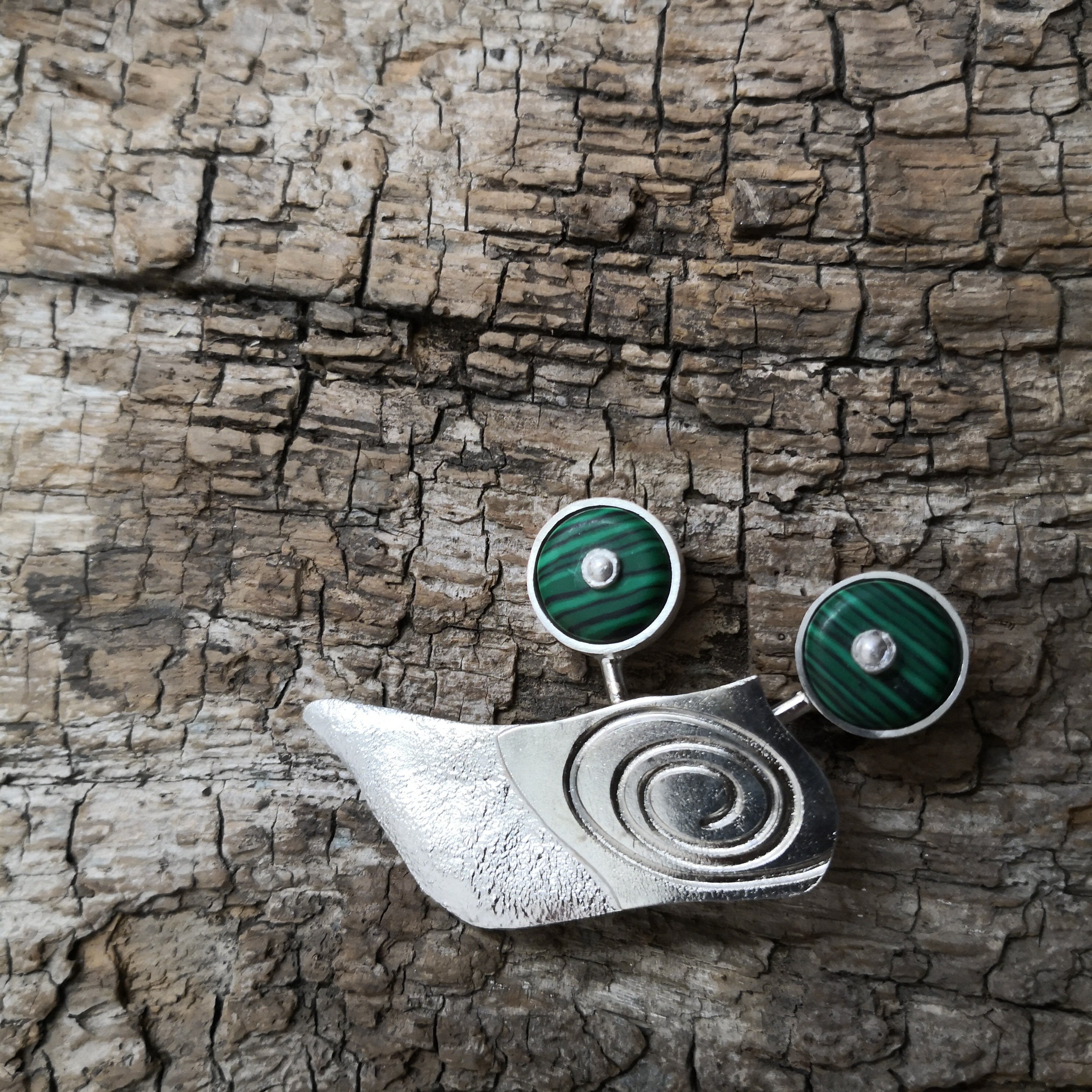 Snail brooch